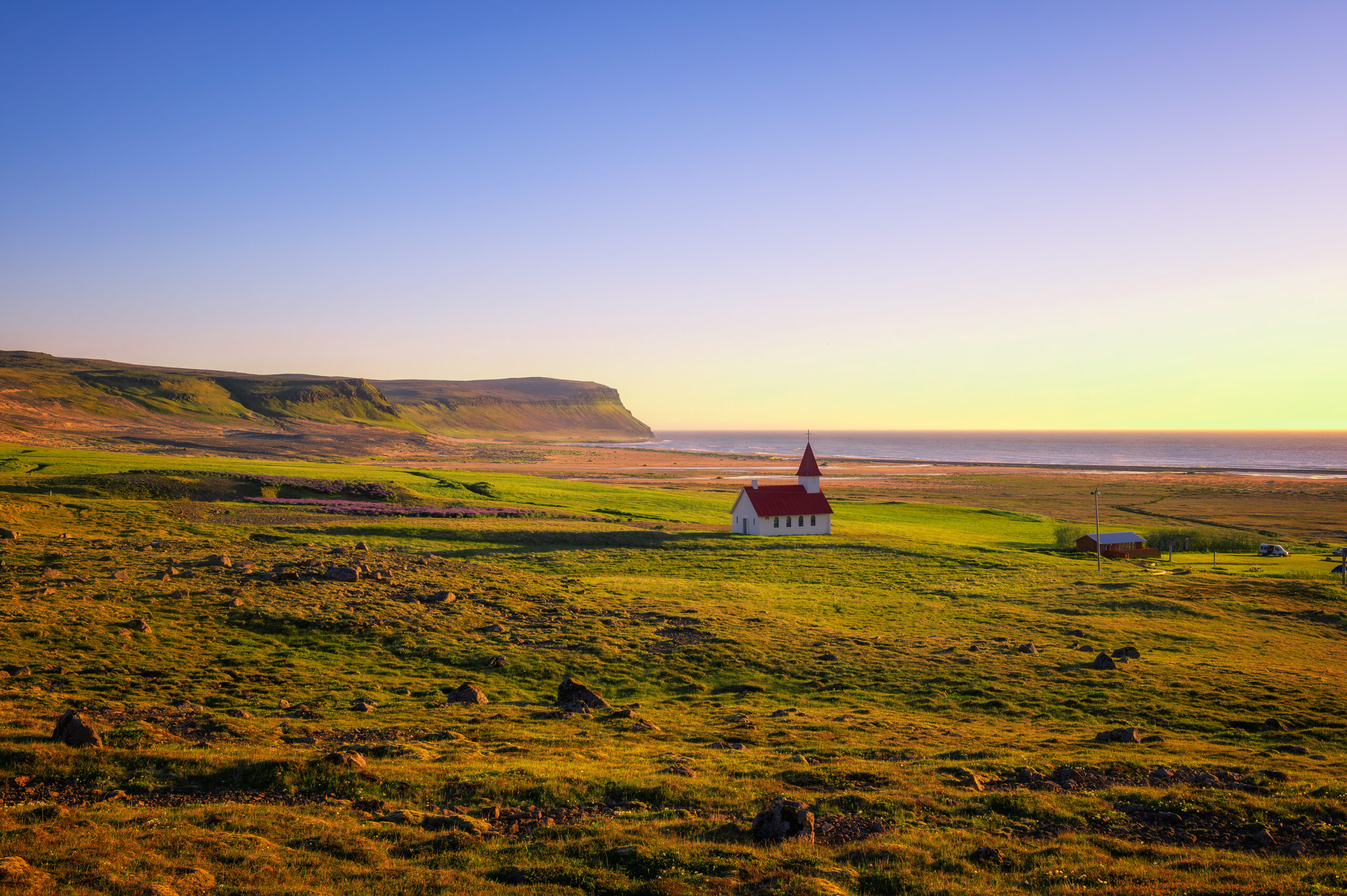 Sunset,At,The,Breidavik,Church,Located,At,The,Sand,Beach